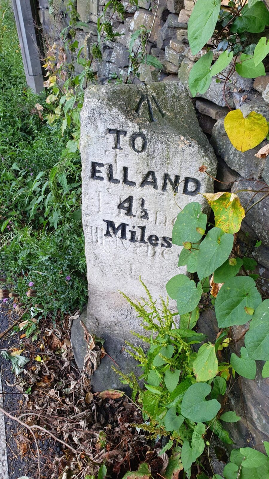 A close-up of the Elland milestone on Elland Road.